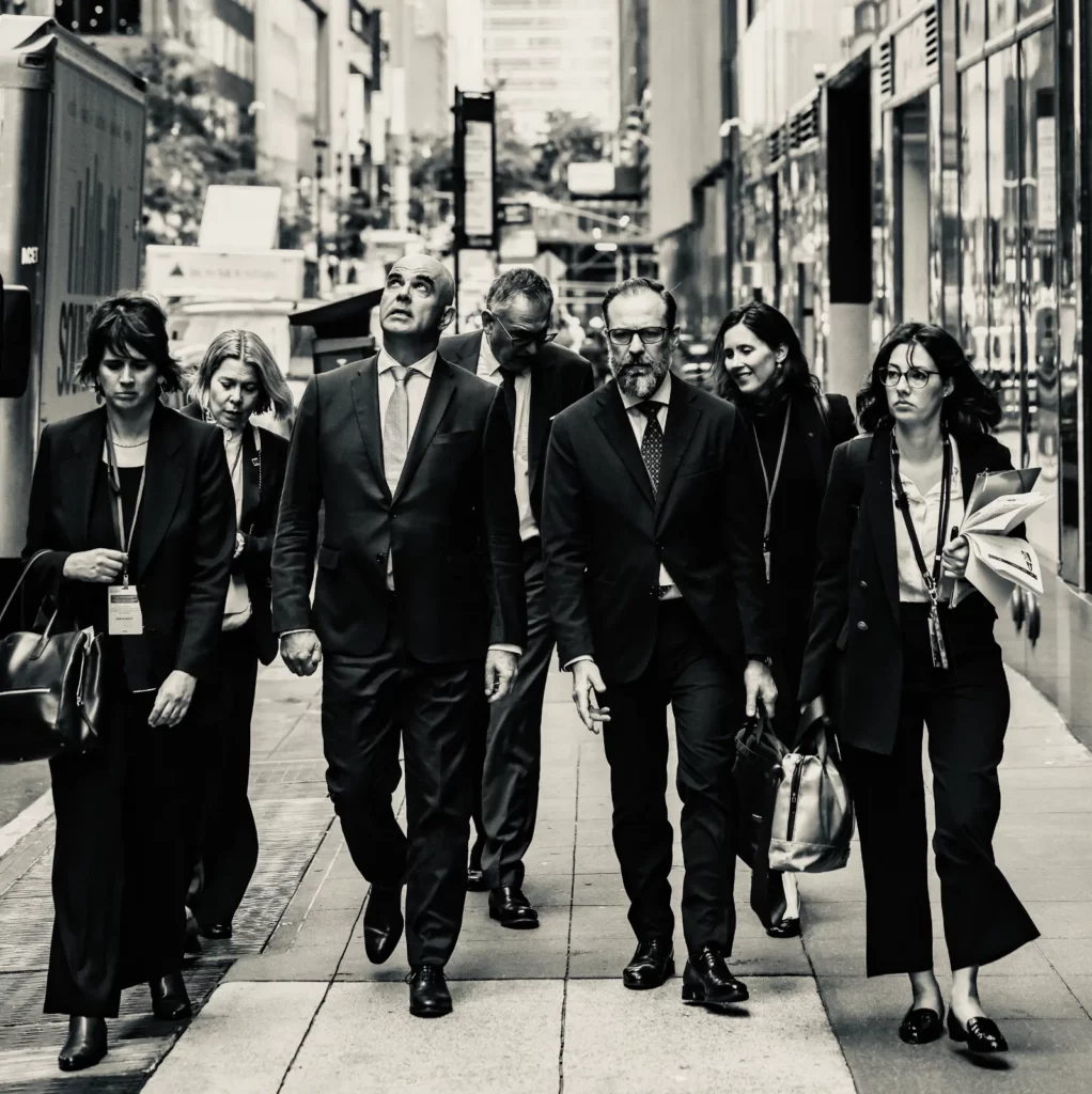Alain Berset and his delegation walking down a Manhattan street, black-and-white photo