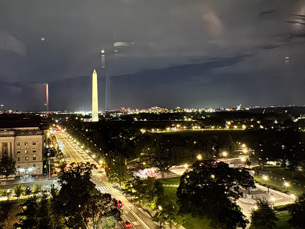 Washington at night, with the Washington Monument lit up